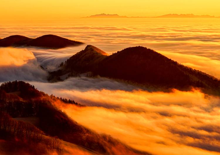 Sunset over the clouds preview