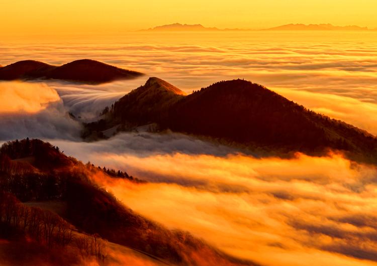 Sunset over the clouds