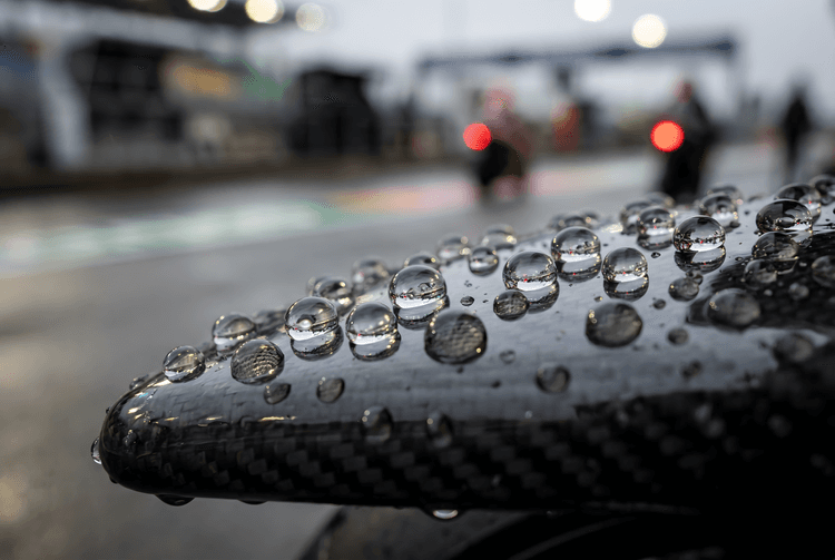 The Tension of Speed: Rain on Carbon Fiber