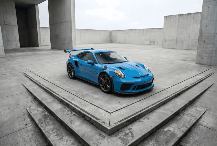 Blue Porsche 911 GT3 RS in Brutalist Setting