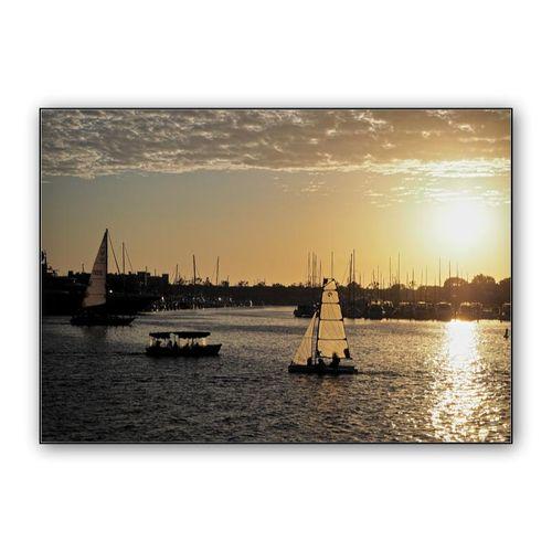 Boats at sunset wall art poster